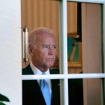 Joe Biden appears to be in the end-stages of Deerintheheadlightsitis. It is likely that moments after this photo was taken, he walked into the door, smearing his makeuup all over the glass.